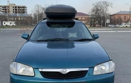 Mazda Familia Y10, 1999 год, 300 000 рублей, 1 фотография