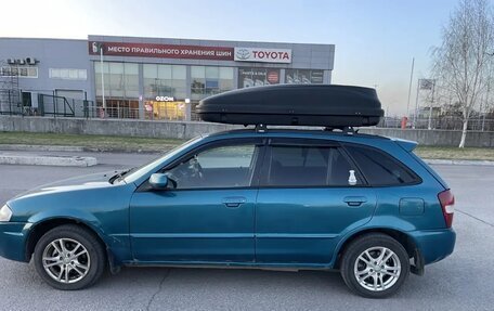 Mazda Familia Y10, 1999 год, 300 000 рублей, 9 фотография