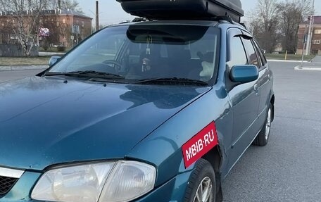 Mazda Familia Y10, 1999 год, 300 000 рублей, 2 фотография
