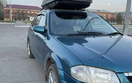 Mazda Familia Y10, 1999 год, 300 000 рублей, 13 фотография
