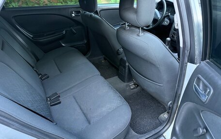 Toyota Avensis III рестайлинг, 2002 год, 250 000 рублей, 20 фотография