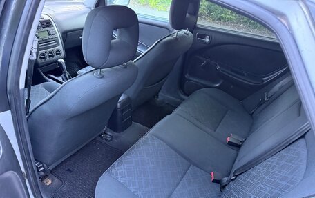 Toyota Avensis III рестайлинг, 2002 год, 250 000 рублей, 21 фотография
