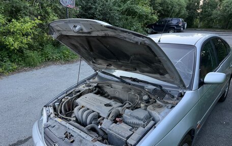 Toyota Avensis III рестайлинг, 2002 год, 250 000 рублей, 22 фотография