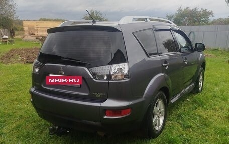 Mitsubishi Outlander III рестайлинг 3, 2010 год, 900 000 рублей, 2 фотография