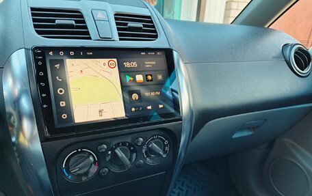 Suzuki SX4 II рестайлинг, 2011 год, 850 000 рублей, 13 фотография