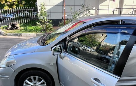 Nissan Tiida, 2011 год, 730 000 рублей, 8 фотография