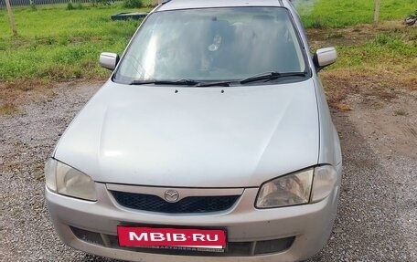 Mazda Familia, 1999 год, 300 000 рублей, 9 фотография