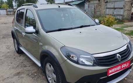Renault Sandero I, 2013 год, 740 000 рублей, 2 фотография