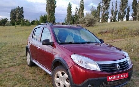 Renault Sandero I, 2013 год, 660 000 рублей, 2 фотография
