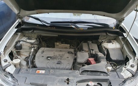 Mitsubishi Outlander III рестайлинг 3, 2012 год, 1 100 000 рублей, 12 фотография