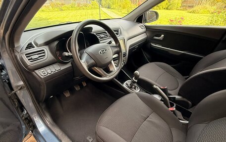 KIA Rio III рестайлинг, 2011 год, 1 100 000 рублей, 10 фотография