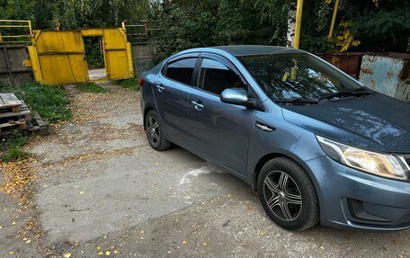 KIA Rio III рестайлинг, 2011 год, 735 000 рублей, 2 фотография