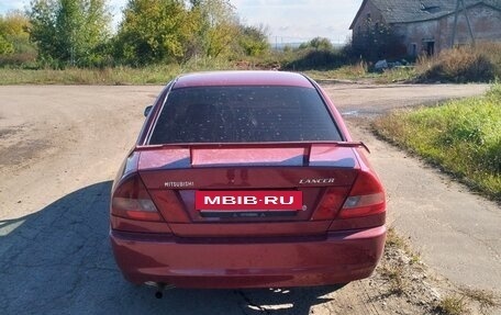 Mitsubishi Lancer VII, 1997 год, 170 000 рублей, 3 фотография