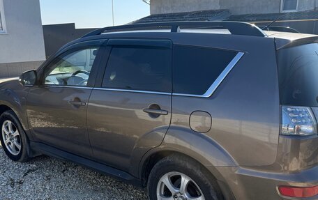 Mitsubishi Outlander III рестайлинг 3, 2011 год, 1 700 000 рублей, 9 фотография