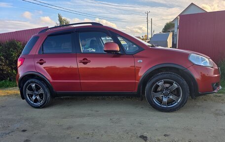Suzuki SX4 II рестайлинг, 2010 год, 670 000 рублей, 19 фотография