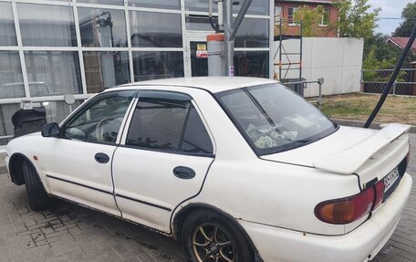 Mitsubishi Lancer VII, 1995 год, 149 000 рублей, 4 фотография