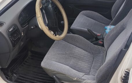 Mitsubishi Lancer VII, 1995 год, 149 000 рублей, 9 фотография