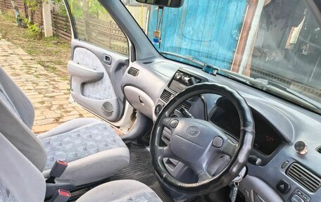 Toyota Raum I, 1998 год, 400 000 рублей, 9 фотография