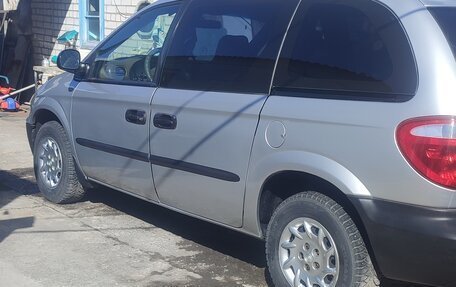 Chrysler Voyager IV, 2001 год, 600 000 рублей, 22 фотография
