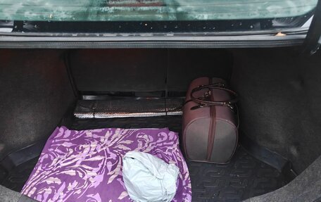 Nissan Tiida, 2010 год, 900 000 рублей, 6 фотография