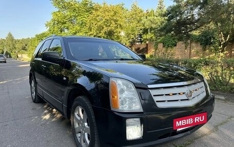 Cadillac SRX II рестайлинг, 2009 год, 478 000 рублей, 21 фотография