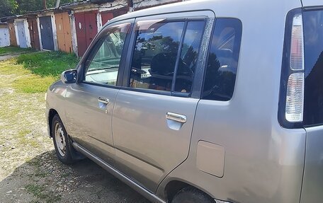 Nissan Cube II, 2001 год, 250 000 рублей, 4 фотография