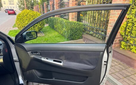 Toyota Corolla, 2003 год, 700 000 рублей, 10 фотография