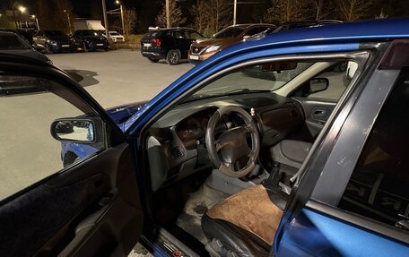 Mazda 323, 1999 год, 250 000 рублей, 9 фотография