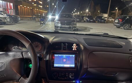 Mazda 323, 1999 год, 250 000 рублей, 13 фотография