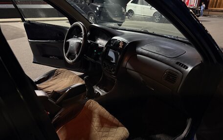 Mazda 323, 1999 год, 250 000 рублей, 10 фотография