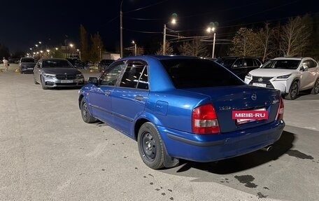 Mazda 323, 1999 год, 250 000 рублей, 6 фотография