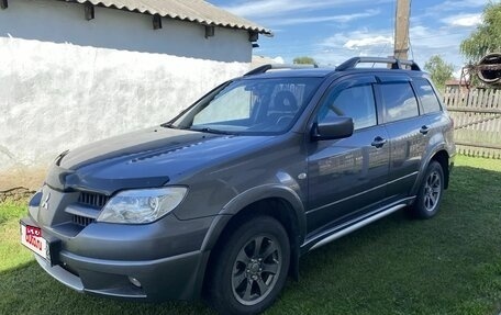 Mitsubishi Outlander III рестайлинг 3, 2006 год, 730 000 рублей, 3 фотография
