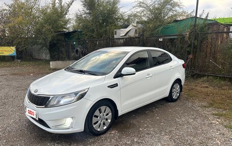 KIA Rio III рестайлинг, 2014 год, 930 000 рублей, 21 фотография