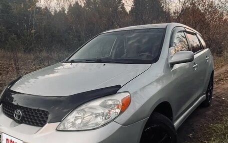 Toyota Matrix, 2004 год, 710 000 рублей, 12 фотография