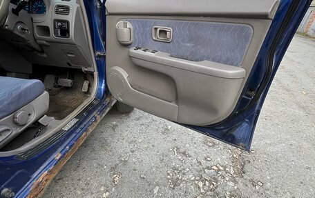 Nissan Cube II, 2001 год, 90 000 рублей, 14 фотография