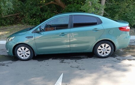 KIA Rio III рестайлинг, 2013 год, 668 000 рублей, 3 фотография