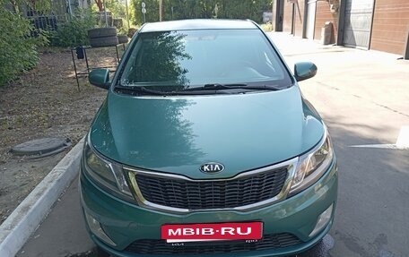 KIA Rio III рестайлинг, 2013 год, 668 000 рублей, 2 фотография