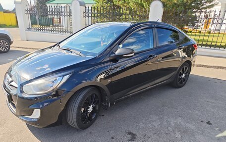 Hyundai Solaris II рестайлинг, 2012 год, 650 000 рублей, 21 фотография