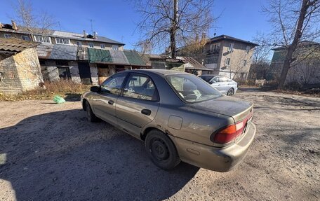 Mazda Protege, 1997 год, 70 000 рублей, 3 фотография