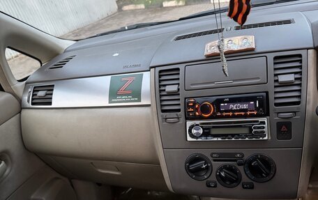 Nissan Tiida, 2004 год, 450 000 рублей, 9 фотография