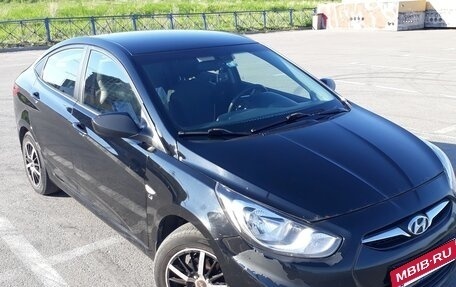 Hyundai Solaris II рестайлинг, 2011 год, 390 000 рублей, 3 фотография