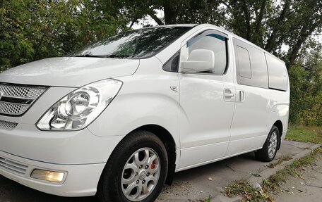 Hyundai Grand Starex Grand Starex I рестайлинг 2, 2011 год, 1 499 000 рублей, 2 фотография
