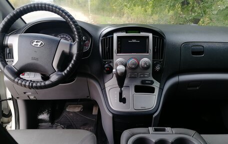 Hyundai Grand Starex Grand Starex I рестайлинг 2, 2011 год, 1 499 000 рублей, 11 фотография