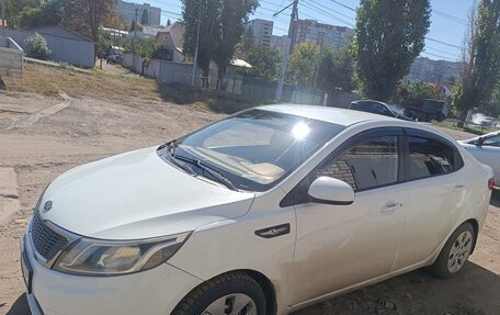 KIA Rio III рестайлинг, 2012 год, 730 000 рублей, 9 фотография