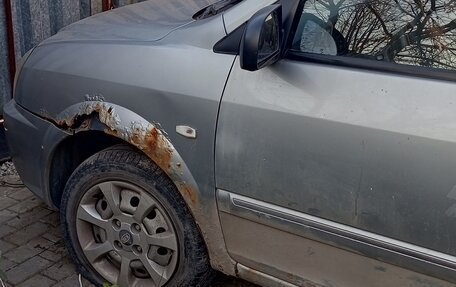 KIA Carens I (RS), 2004 год, 150 000 рублей, 11 фотография