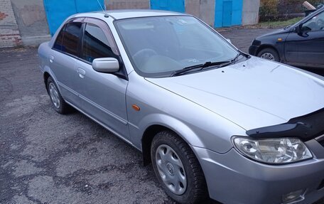 Mazda Familia, 2002 год, 385 000 рублей, 1 фотография