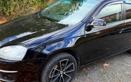 Volkswagen Jetta VII, 2009 год, 450 000 рублей, 3 фотография