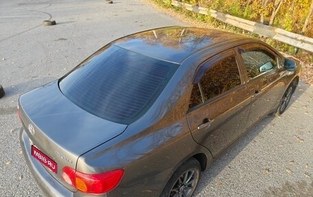 Toyota Corolla, 2007 год, 600 000 рублей, 13 фотография
