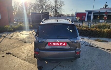 Mitsubishi Outlander III рестайлинг 3, 2011 год, 1 500 000 рублей, 11 фотография