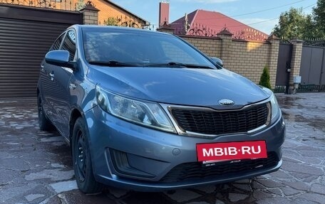 KIA Rio III рестайлинг, 2013 год, 700 000 рублей, 3 фотография